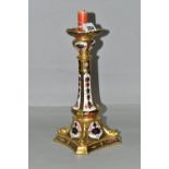 A ROYAL CROWN DERBY OLD IMARI 1128 SOLID GOLD BAND CANDLESTICK, heavily gilded with dolphin detail