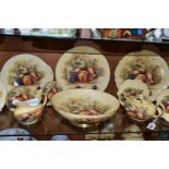 ELEVEN PIECES OF AYNSLEY ORCHARD GOLD TEA AND DINNER WARES, comprising a footed fruit/salad bowl,