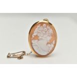 A CAMEO BROOCH PENDANT, oval shell cameo depicting a ladys profile, collet set in yellow metal,