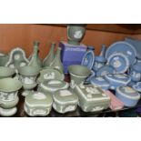 A QUANTITY OF WEDGWOOD JASPERWARES, approximately fifty five pieces, mainly in sage green and pale