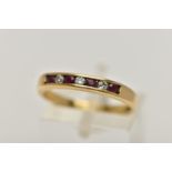 AN 18CT GOLD RUBY AND DIAMOND SEVEN STONE RING, designed as four circular rubies interspaced by