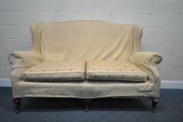 A 19TH CENTURY THREE SEATER SOFA, with beige floral cover on top of white and floral upholstery (