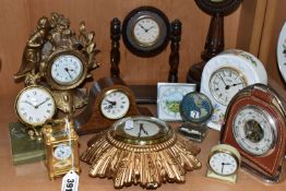 A COLLECTION OF SMALL CLOCKS, to include a miniature glass cased carriage clock with visible