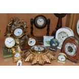 A COLLECTION OF SMALL CLOCKS, to include a miniature glass cased carriage clock with visible