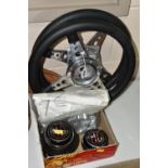 TWO VINTAGE M.G STEERING WHEELS, made by Moto-Lita, with M.G centre pieces (1 box + loose)