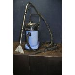 A NUMATIC CT-470-2 WET AND DRY VACUUM CLEANER with pipework and wet head (PAT pass and working but