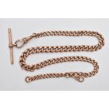 AN EARLY 20TH CENTURY GOLD ALBERT CHAIN, an AF rose gold graduated curb link chain, fitted with a