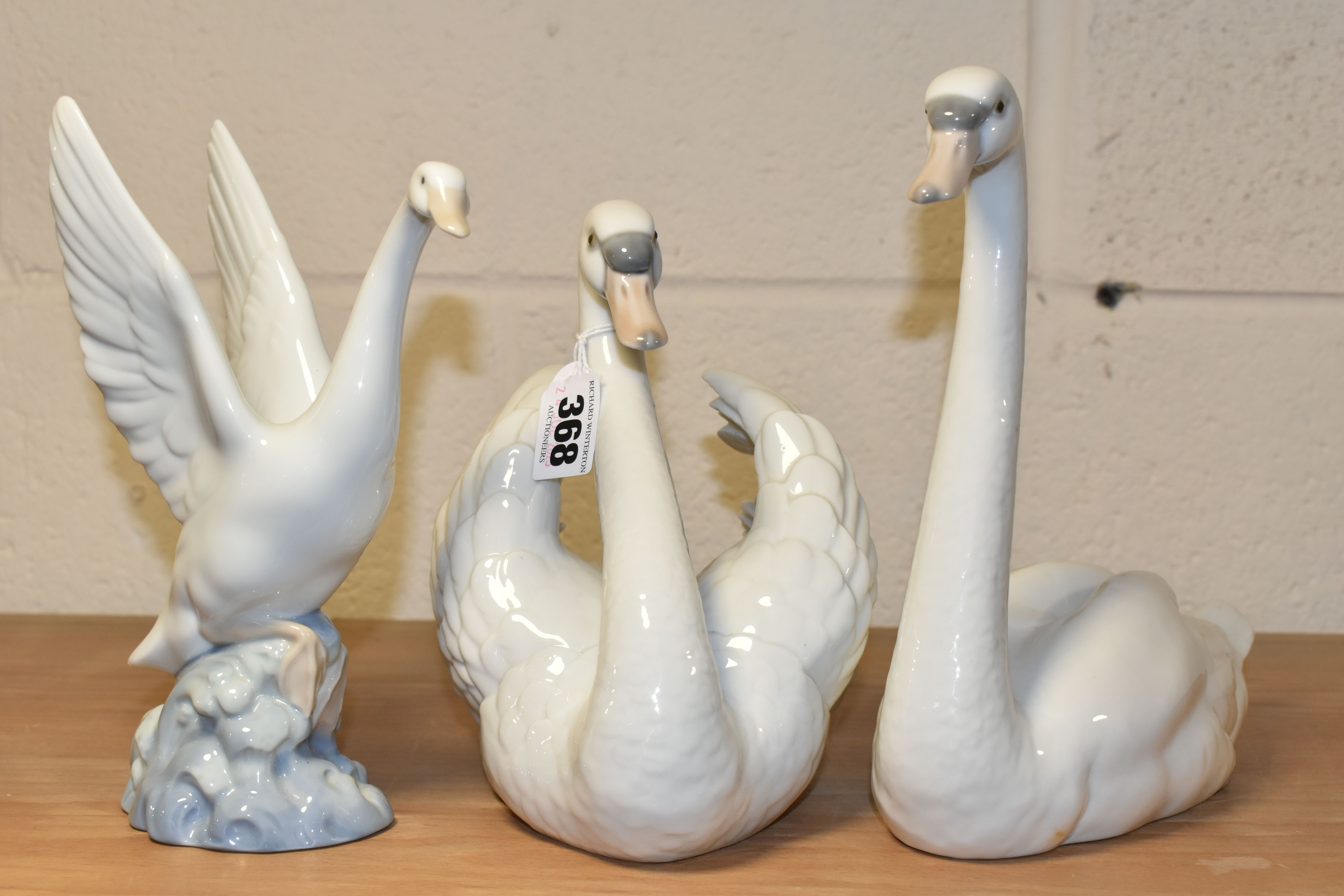 TWO LLADRO SWANS AND A NAO DUCK, comprising a Swan with wings spread, no 5231, issued 1984-2004, - Image 2 of 4