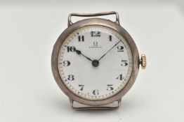 AN EARLY 20TH CENTURY SILVER 'OMEGA' WATCH HEAD, manual wind requires some attention, round white