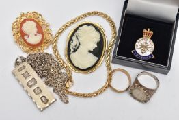 AN ASSORTMENT OF SILVER AND COSTUME JEWELLERY, to include a silver hallmarked ingot, suspended