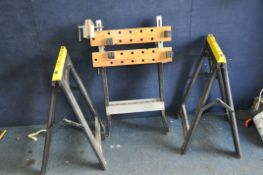 A FOLDING WORK BENCH WITH A STANLEY No702 VICE FITTED and a pair of ZAG plastic saw horses