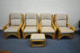 FOUR WICKER CONSERVATORY ARMCHAIRS, and a stool, all with beige upholstery (condition - general