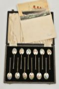 CUNARD INTEREST, A CASED SET OF TWELVE SILVER AND ENAMEL COFFEE SPOONS AND A SIGNED CUNARD QUEEN