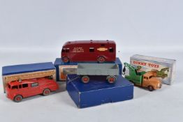 FOUR BOXED DINKY TOYS DIE-CAST MODELS, the first a Fire Engine with Extending Ladder no.555, red
