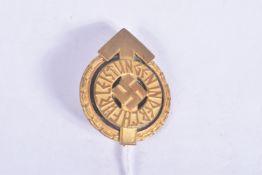 A THIRD REICH GERMAN HITLER YOUTH GOLD AWARD LEADERS BADGE, this is gilt metal with a black enamel