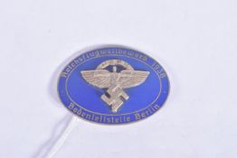A GERMAN THIR REICH NSFK BLUE ENAMEL BADGE, these was given out for various flying competitions in