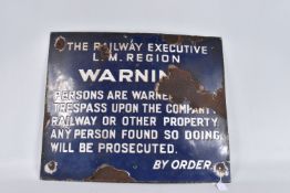 AN ENAMELLED TINPLATE RAILWAY WARNING SIGN, The Railway Executive L.M. Region Warning to