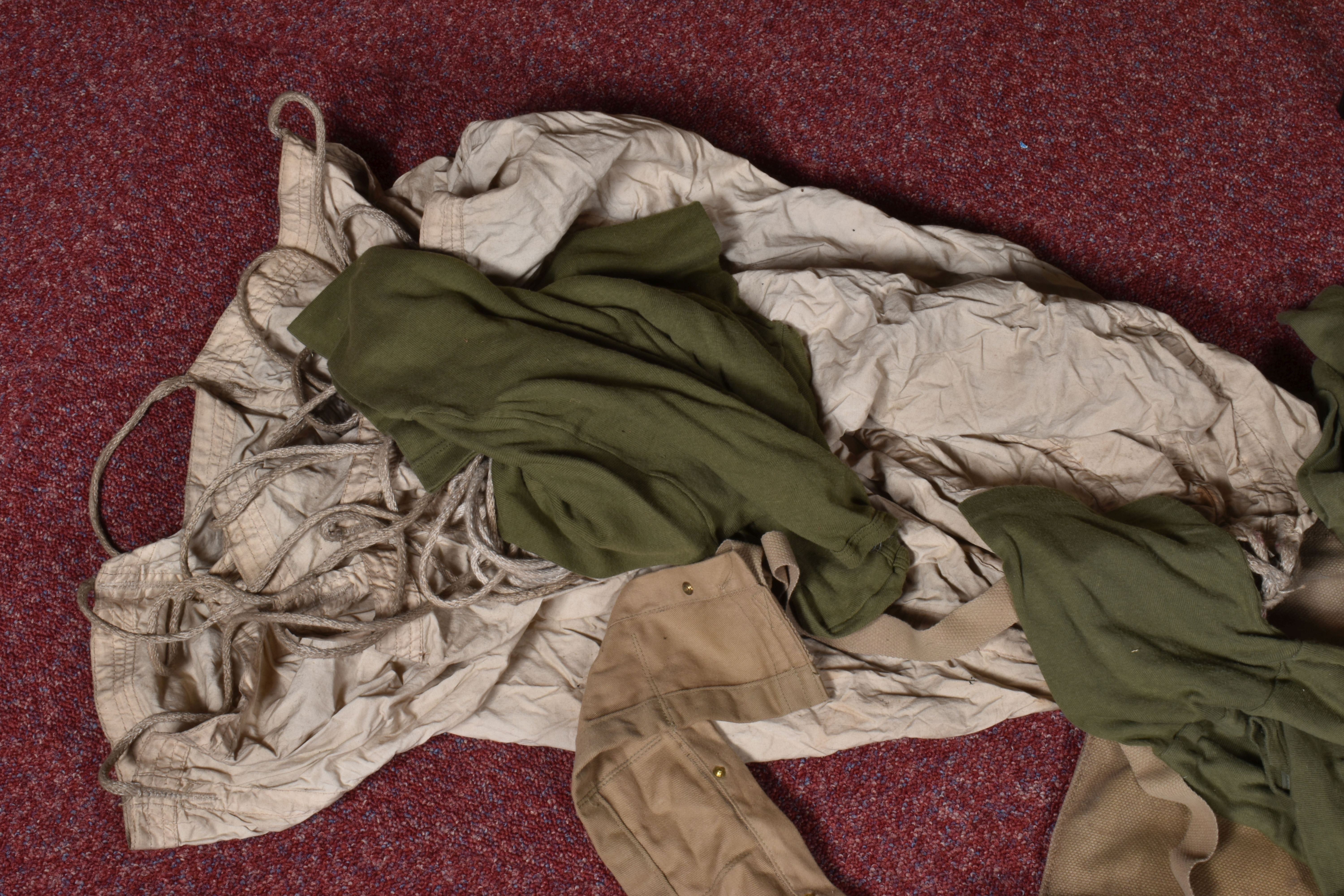 A QUANTITY OF MILITARY RELATED ITEMS, to include four groundsheets, four olive green t shirts, - Image 10 of 12