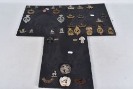 A COLLECTION OF CAP BADGES, collar badges, shoulder titles and a helmet badges, they are a mix of