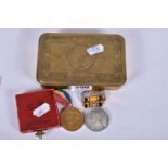 A WWI PRINCESS MARY TIN AND TWO MEDALS, the tin is in good condition and without any splits, the