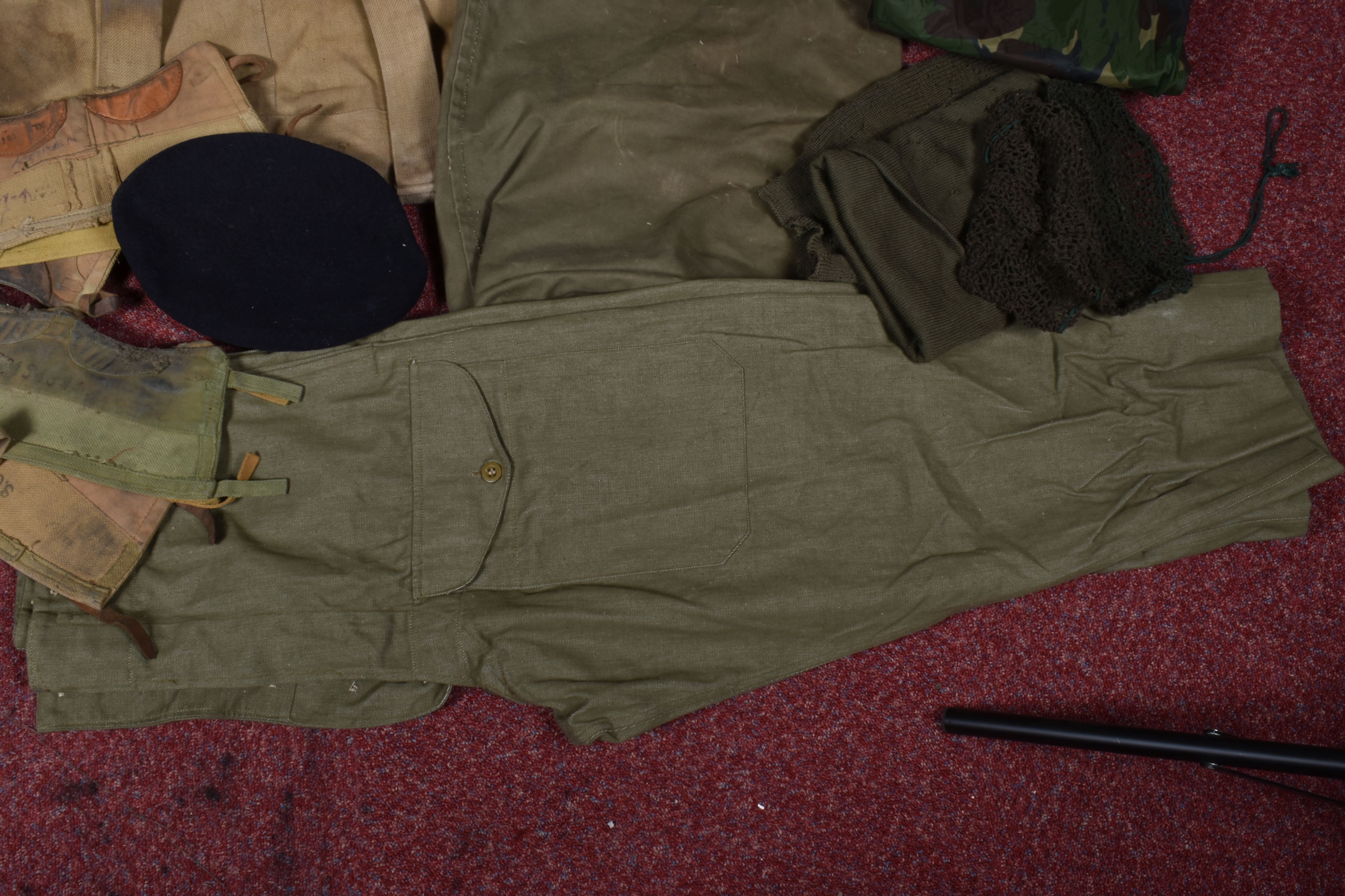 A QUANTITY OF MILITARY RELATED ITEMS, to include four groundsheets, four olive green t shirts, - Image 7 of 12