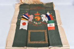 A WWI CLOTH MEMORIAL WALL DISPLAY, this is un-framed and features a green cloth background and a