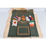 A WWI CLOTH MEMORIAL WALL DISPLAY, this is un-framed and features a green cloth background and a