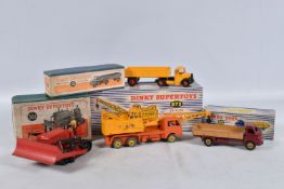 FOUR MECCANO DINKY SUPERTOYS MODEL DIE-CAST VEHICLES, the first a Blaw Knox Bulldozer no.561, red in