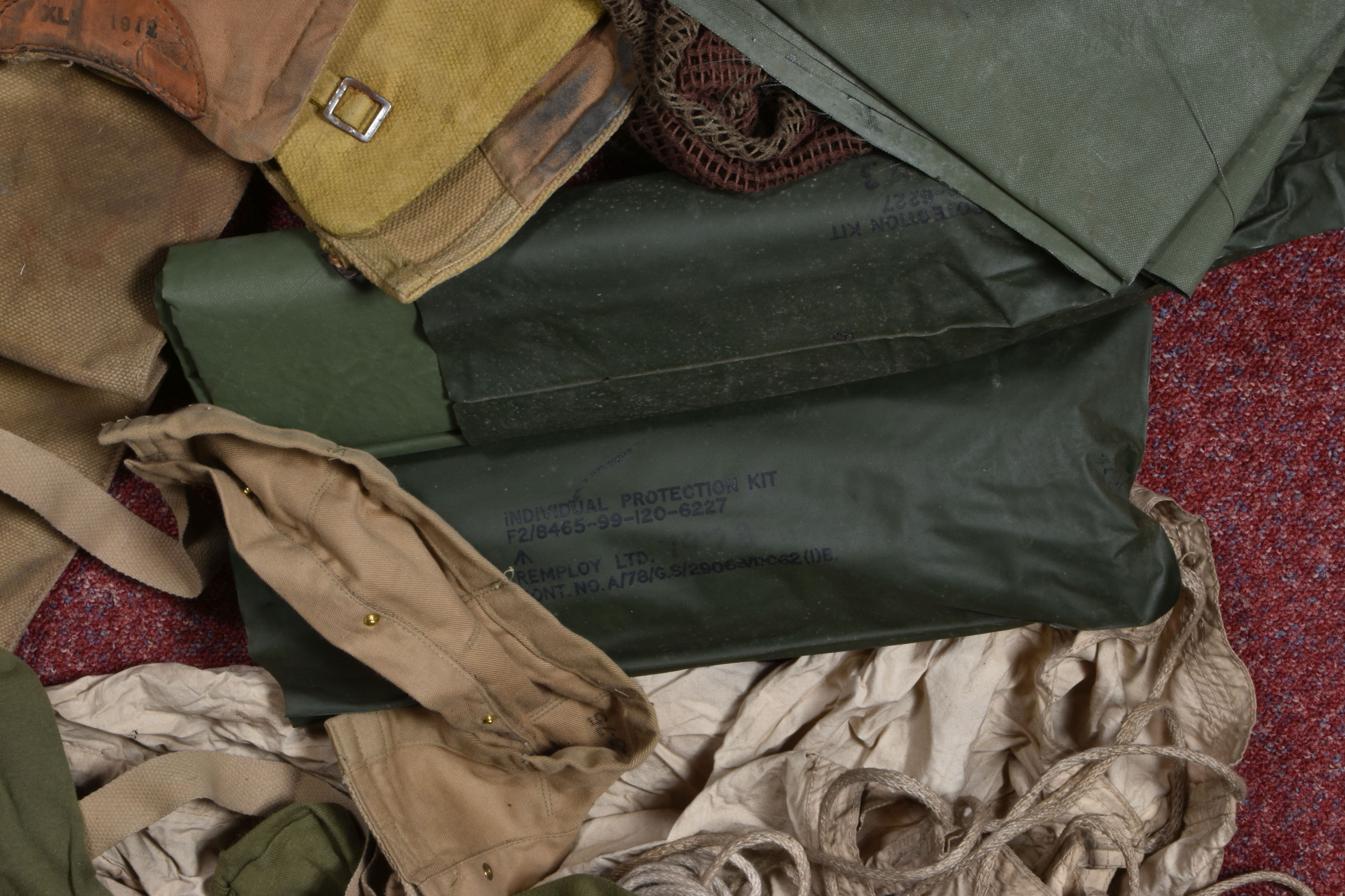 A QUANTITY OF MILITARY RELATED ITEMS, to include four groundsheets, four olive green t shirts, - Image 4 of 12