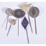 SIX VARIOUS NAZI GERMANY STICK PINS, these include one with D&B inside a triangle, a gold Swastika