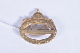 A WWI ERA IMPERIAL GERMANY U-BOAT BADGE, this is bronze in colour and has a pin fastener, it has