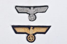 TWO THIRD REICH GERMAN UNIFORM BREAST EAGLES, one has gold thread and the other has silver thread,