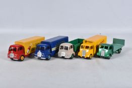 FIVE UNBOXED AND ASSORTED DINKY TOYS GUY LORRIES AND VANS, all have been modified, rebuilt and/or