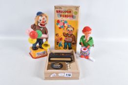 A BOXED YONEZAWA BATTERY OPERATED TINPLATE BALLOON VENDOR, not tested, tinplate base with dressed