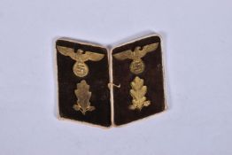 A PAIR OF NAZI GERMANY UNIFORM COLLAR PATCHES, these have the eagle on a Swastika, these were worn