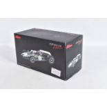 A BOXED SCHUCO EXKLUSIV COOPER T53 #1 SIEGER GREAT BRITAIN GP 1960 1:18 MODEL RACECAR, numbered 45