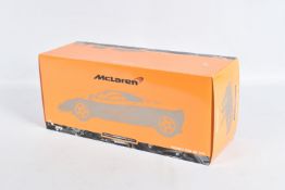 A BOXED MINICHAMPS MCLAREN F1 ROAD CAR 1994 1:18 MODEL VEHICLE, numbered 530 133421, painted orange,