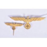 TWO NAZI GERMANY EAGLE PIN BADGES, the first is a stick pin and the second is an officers cap badge,