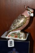A BOXED ROYAL CROWN DERBY LIMITED EDITION PINK COCKATOO PAPERWEIGHT, no. 895/2500, with gold