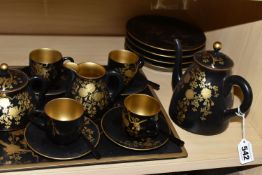 A CHINESE LACQUER WARE COFFEE SET, comprising of a tray, six cups, saucers and spoons, coffee pot,