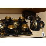 A CHINESE LACQUER WARE COFFEE SET, comprising of a tray, six cups, saucers and spoons, coffee pot,