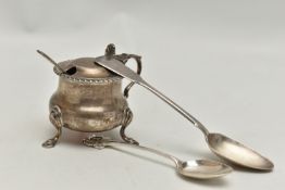A LATE VICTORIAN SILVER MUSTARD POT AND TWO SILVER TEASPOONS, the silver mustard pot with three