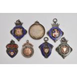 AN ASSORTMENT OF SILVER MEDALS, seven sporting medals, four with gold embellishments, six hallmarked