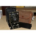 A ZEISS IKON IDEAL FOLDING QUARTER PLATE CAMERA, fitted with a 13.5cm f4 Dominar lens and compur
