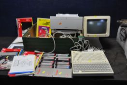 AN APPLE 2C PERSONAL COMPUTER (powers up but not tested any further) with power supply, a G092S