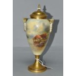 A ROYAL WORCESTER TWIN HANDLED OVOID PEDESTAL VASE AND COVER HAND PAINTED WITH TWO HIGHLAND CATTLE