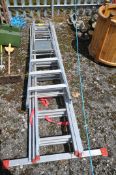 AN ALUMINIUM 2.56M TRIPLE EXTENSION LADDER, and an aluminium step ladder (2)