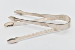 TWO SILVER SUGAR TONGS, the first pair detailed with a bright cut pattern, partially hallmarked 'WC'