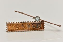 TWO MID 19TH/EARLY 20TH CENTURY BROOCHES, the first a rose gold polished bar brooch set with a