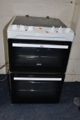 A ZANUSSI OVEN, with a ceramic hob, and two doors, width 55cm x depth 65cm x height 89cm (untested
